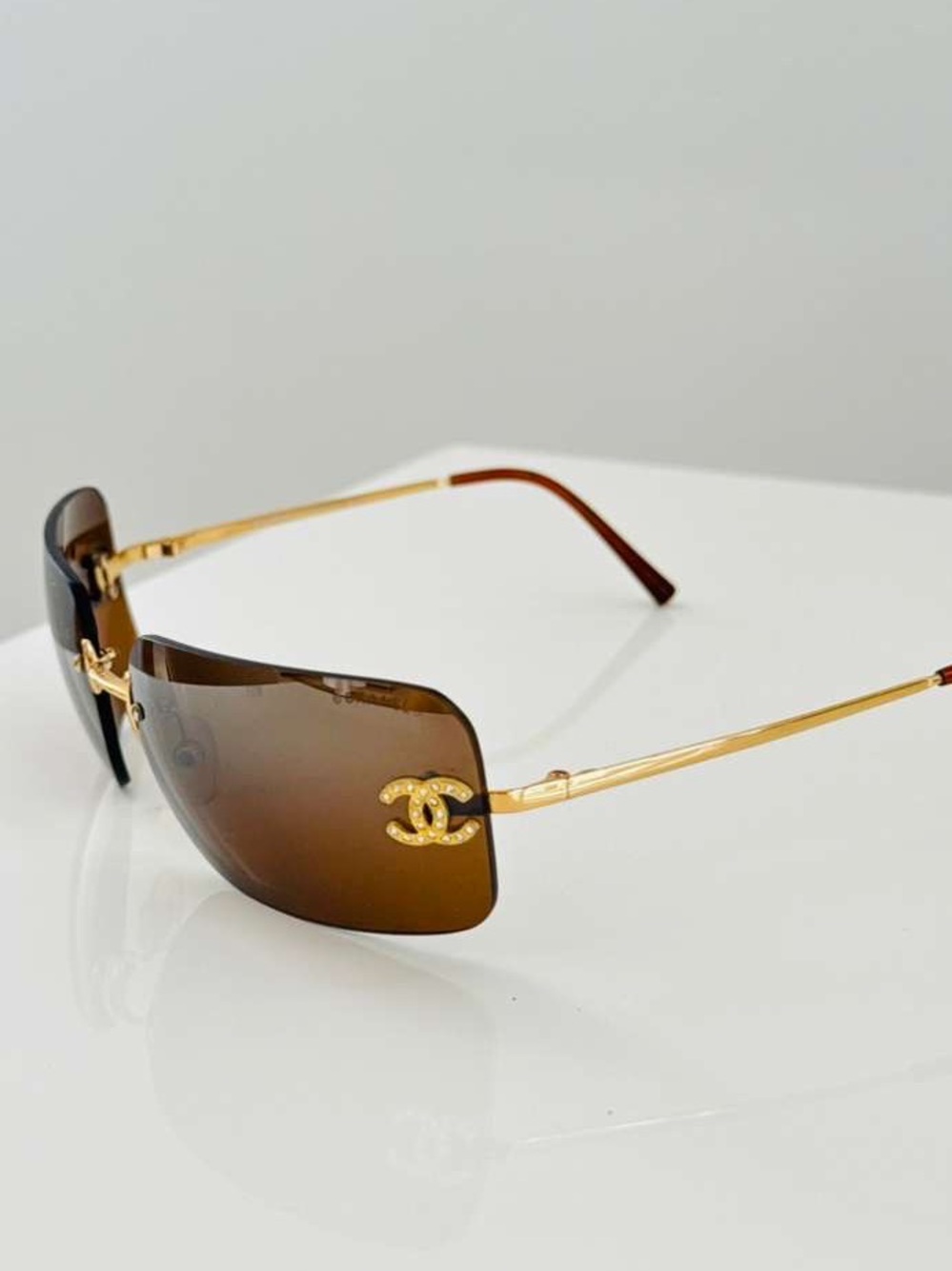 CHANEL Brown Rimless Sunglasses with Gold CC Accents - Picture 10 of 14
